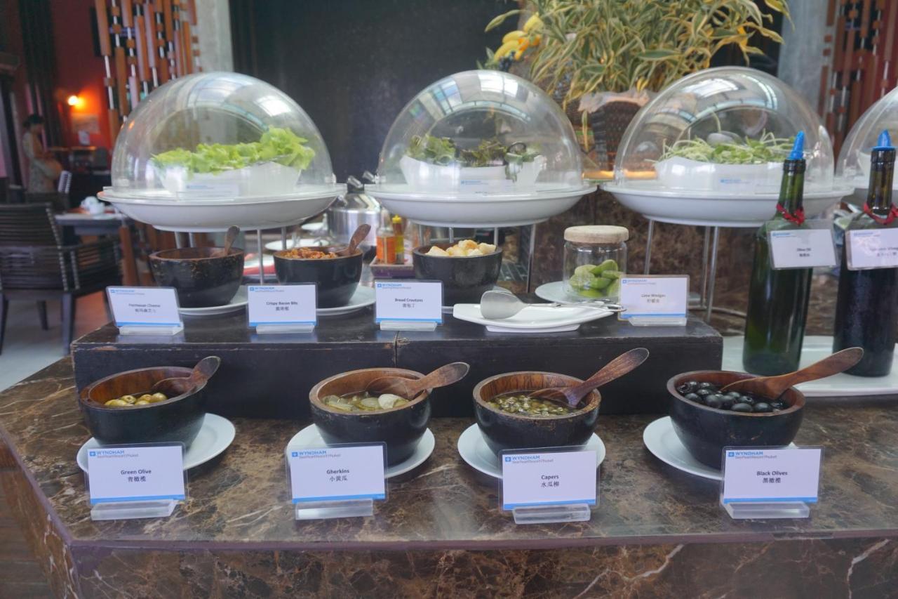 Wyndham Sea Pearl Resort, Phuket Patong المظهر الخارجي الصورة A selection of garnishes at a buffet